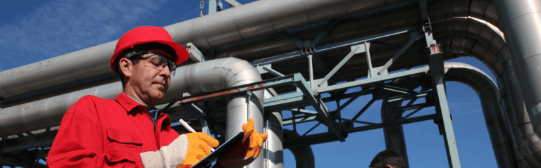 maintenance manager working in some pipes